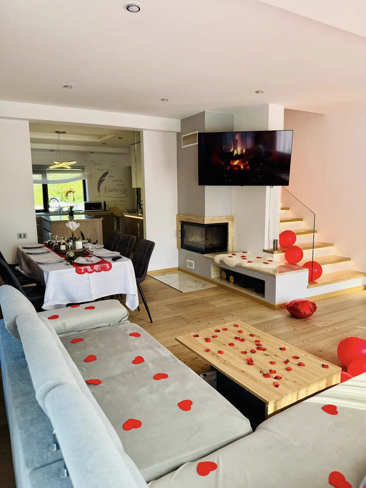Living room decorated for Valentine's Day with hearts and petals