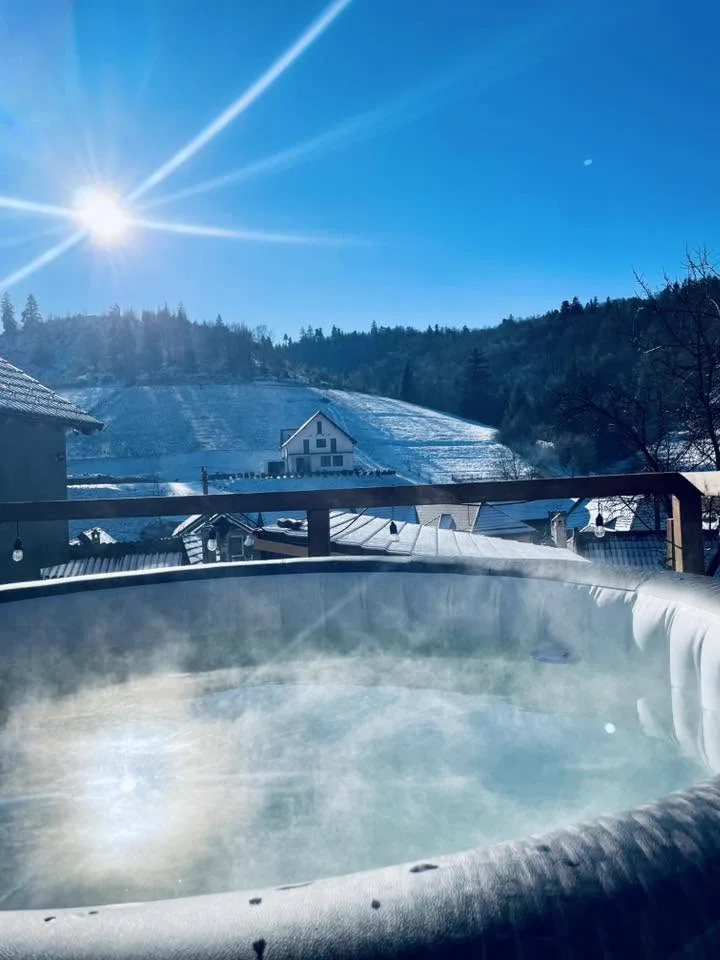 Hot tub steaming on a sunny winter day
